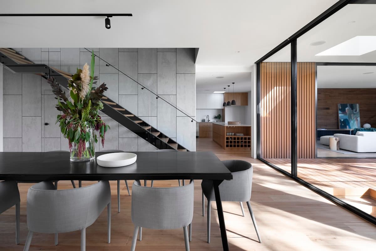 Glass dining room opening to the terrace